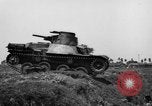 Image of Japanese tank crosses ditch India, 1944, second 22 stock footage video 65675041509