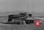 Image of tanks outfitted with hedgerow cutters and flame throwers Europe, 1944, second 62 stock footage video 65675041512