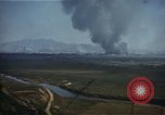 Image of burning village Korea, 1950, second 3 stock footage video 65675041558