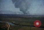 Image of burning village Korea, 1950, second 5 stock footage video 65675041558