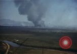 Image of burning village Korea, 1950, second 6 stock footage video 65675041558