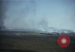 Image of burning village Korea, 1950, second 12 stock footage video 65675041558