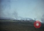 Image of burning village Korea, 1950, second 15 stock footage video 65675041558