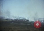Image of burning village Korea, 1950, second 17 stock footage video 65675041558