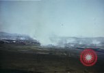 Image of burning village Korea, 1950, second 22 stock footage video 65675041558
