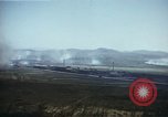 Image of burning village Korea, 1950, second 29 stock footage video 65675041558
