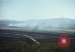 Image of burning village Korea, 1950, second 35 stock footage video 65675041558