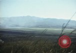 Image of burning village Korea, 1950, second 38 stock footage video 65675041558
