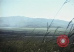 Image of burning village Korea, 1950, second 39 stock footage video 65675041558