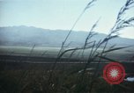 Image of burning village Korea, 1950, second 42 stock footage video 65675041558