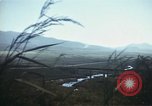 Image of burning village Korea, 1950, second 46 stock footage video 65675041558