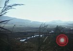 Image of burning village Korea, 1950, second 47 stock footage video 65675041558