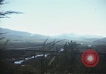 Image of burning village Korea, 1950, second 48 stock footage video 65675041558