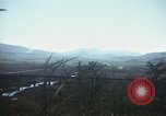 Image of burning village Korea, 1950, second 49 stock footage video 65675041558