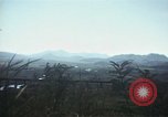 Image of burning village Korea, 1950, second 51 stock footage video 65675041558
