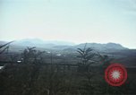 Image of burning village Korea, 1950, second 53 stock footage video 65675041558