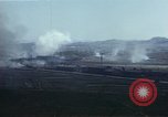 Image of burning village Korea, 1950, second 56 stock footage video 65675041558