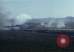 Image of burning village Korea, 1950, second 58 stock footage video 65675041558