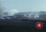 Image of burning village Korea, 1950, second 62 stock footage video 65675041558