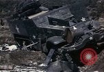 Image of Destroyed Army convoy Hoengsong Korea, 1951, second 33 stock footage video 65675041573