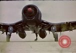 Standbild F4U Corsair Korea, 1950, aus Sekunde 40 historischem Filmmaterial Videoclip 65675041598