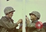 Standbild Rocket Barrage in der koreanischen Krieg Wolmi-Do Insel Korea, 1950, aus Sekunde 12 historischem Filmmaterial Videoclip 65675041600