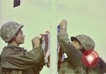 Standbild Rocket Barrage in der koreanischen Krieg Wolmi-Do Insel Korea, 1950, aus Sekunde 13 historischem Filmmaterial Videoclip 65675041600
