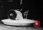 Image of flying scooters Princeton New Jersey USA, 1959, second 15 stock footage video 65675041631