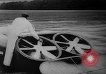 Image of flying scooters Princeton New Jersey USA, 1959, second 18 stock footage video 65675041631