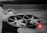 Image of flying scooters Princeton New Jersey USA, 1959, second 19 stock footage video 65675041631