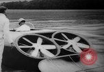 Image of flying scooters Princeton New Jersey USA, 1959, second 20 stock footage video 65675041631