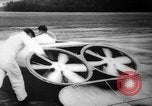 Image of flying scooters Princeton New Jersey USA, 1959, second 23 stock footage video 65675041631