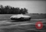 Image of flying scooters Princeton New Jersey USA, 1959, second 35 stock footage video 65675041631