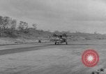 Immagine di Danni di bomba Balikpapan Borneo Indonesia, 1945, secondo 56 filmato di repertorio 65675041656