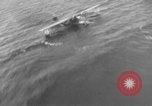 Immagine di Costruttiva PBY Catalina va in crash durante il salvataggio Air-Sea Celebes Paesi Bassi Indie Orientali, 1945, secondo 45 filmato di repertorio 65675041658