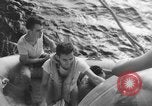Immagine di Costruttiva PBY Catalina va in crash durante il salvataggio Air-Sea Celebes Paesi Bassi Indie Orientali, 1945, secondo 61 filmato di repertorio 65675041658