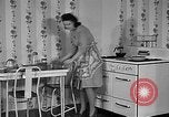 Image of housewife in 1930s United States USA, 1938, second 3 stock footage video 65675041917