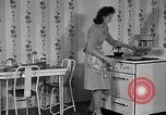 Image of housewife in 1930s United States USA, 1938, second 4 stock footage video 65675041917