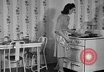 Image of housewife in 1930s United States USA, 1938, second 7 stock footage video 65675041917