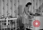 Image of housewife in 1930s United States USA, 1938, second 8 stock footage video 65675041917