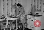 Image of housewife in 1930s United States USA, 1938, second 10 stock footage video 65675041917
