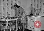Image of housewife in 1930s United States USA, 1938, second 11 stock footage video 65675041917