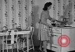 Image of housewife in 1930s United States USA, 1938, second 13 stock footage video 65675041917