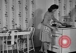 Image of housewife in 1930s United States USA, 1938, second 14 stock footage video 65675041917