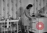 Image of housewife in 1930s United States USA, 1938, second 15 stock footage video 65675041917