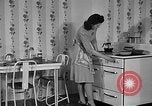 Image of housewife in 1930s United States USA, 1938, second 16 stock footage video 65675041917