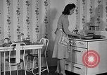 Image of housewife in 1930s United States USA, 1938, second 17 stock footage video 65675041917