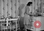 Image of housewife in 1930s United States USA, 1938, second 18 stock footage video 65675041917