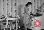 Image of housewife in 1930s United States USA, 1938, second 19 stock footage video 65675041917