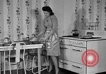 Image of housewife in 1930s United States USA, 1938, second 20 stock footage video 65675041917